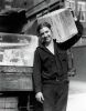 'A man delivering ice in the old days when there were no refrigerators, 1930s'