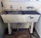 'Classic Concrete sinks that were located in the laundry.'