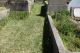 'h: Grave site now just plot of grass. No headstone.'