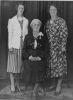 'Barbara Wheatley Seated, with daughter Alma on her right.'